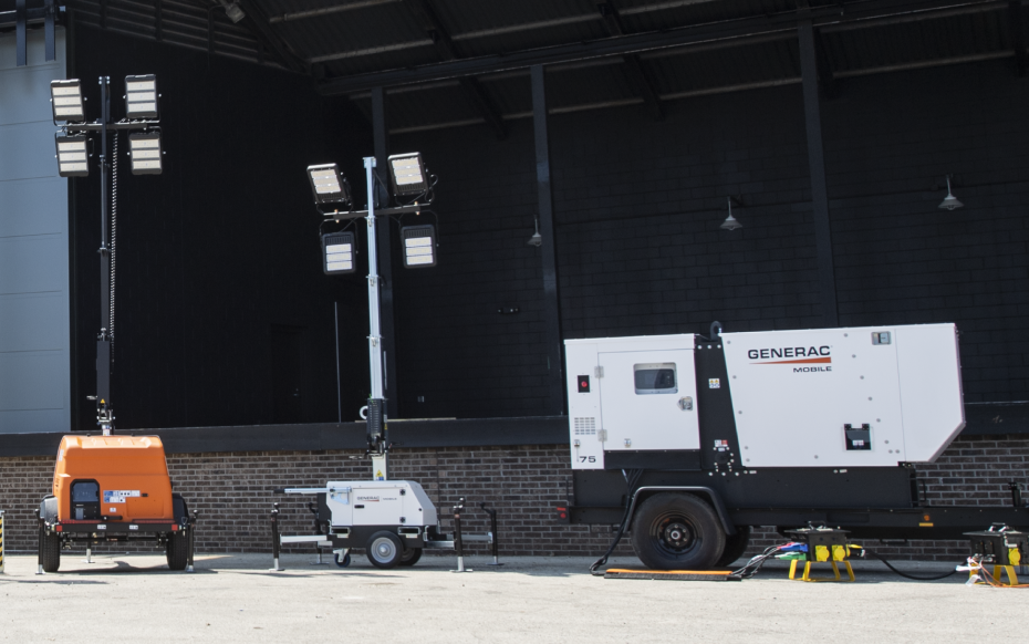 Generac light towers in front of a stage