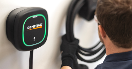 Technician installing a Generac Level 2 EV Charger