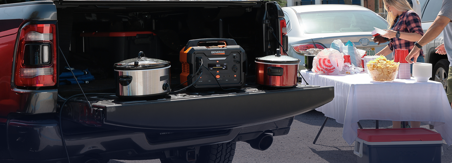 Generac portable power station powering slow cookers at a tailgate